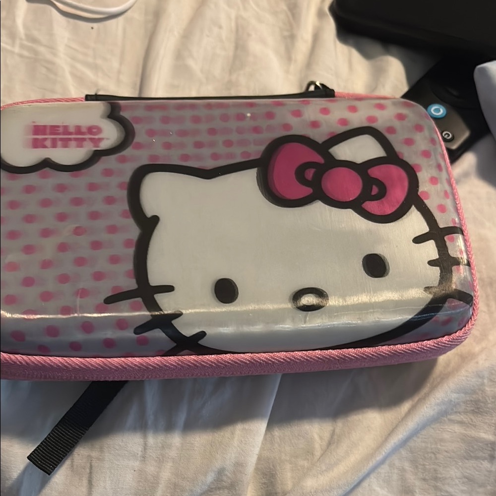 Hello Kitty Pink Polka Dot nitendo DS case with the nitendo DS and 2 games